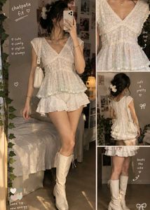 Sheer White Peplum Top with Ruffle Details