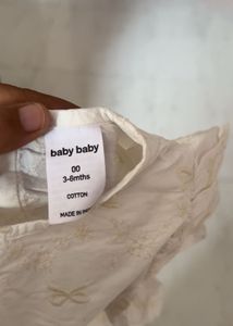 cream infant romper from anko features embroidered