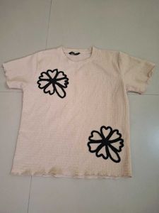 Cream Textured Top with Black Flower Applique