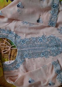 light peach coloure suit