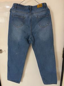Distressed Blue Denim Jeans