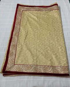 Festive Cream Saree with Red Blouse