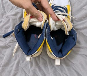 Nike x Sacai Blazer Mid “Varsity Maize”