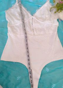 Elegant White Lace Bodysuit