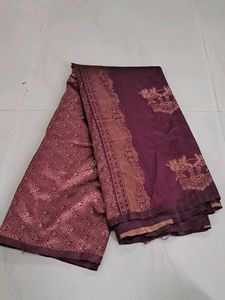 Elegant Maroon Saree with Intricate Designs