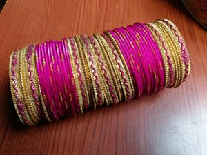 Pink And Golden Metal Bangles