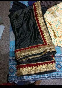 Elegant Black Saree with Gold Border