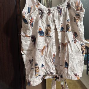 Sleevless Back Cut Design Top With Tie Knot Behind