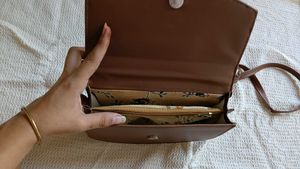Chic Brown Handbag with Gold Logo