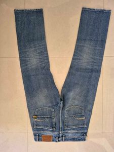 Distressed Blue Denim Jeans