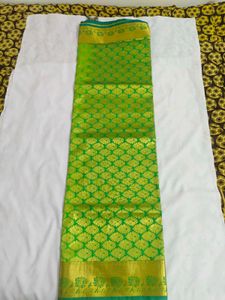 Vibrant Green Silk Saree with Gold Border