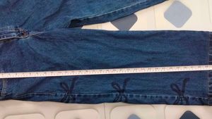 Blue Wide Leg Jeans with Bow Detail