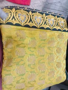 Elegant Yellow Saree with Intricate Border