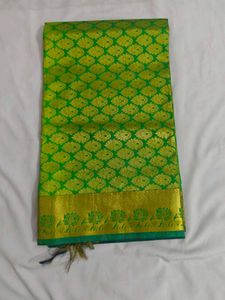 Vibrant Green Silk Saree with Gold Border