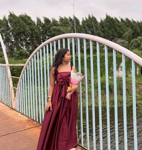 Elegant Maroon Gown with Bow Detail