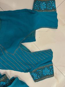 Beautiful Teal Saree with Embellishments