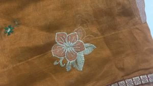 Elegant Brown Embroidered Saree