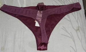 Elegant Thong with Sequins and Bow Detail