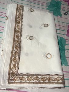 Brown Floral Bordered White Saree