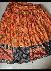 Vibrant Orange Printed semistich Lehenga Choli Set