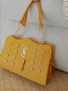 Stylish Yellow Tote Bag with Gold Accents
