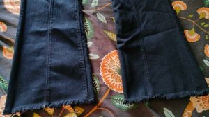 Flared Jeans with Raw Hem