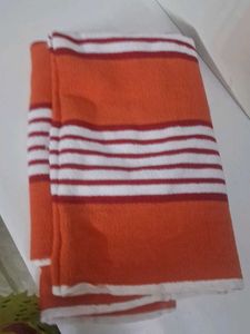 Orange and White Striped Folded Fabric