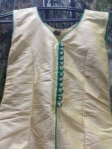 Elegant Beige Kurta with Green Trim