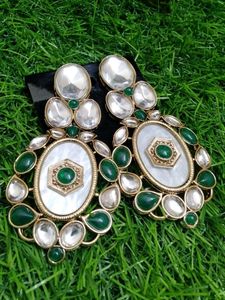 Elegant Oval Earrings with Green Stones
