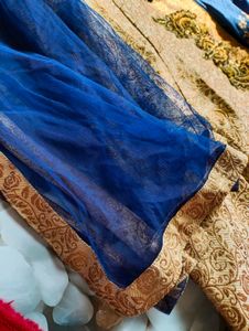 Blue Lehenga With Golden Kurti And Dupatta