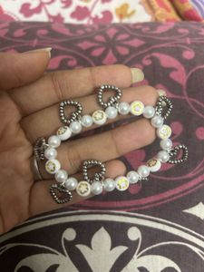 Charming Beaded Bracelet with Heart Charms