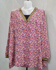 Chic Floral Print Top with Embellished Neckline
