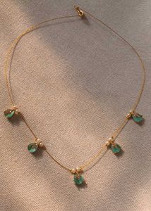 Elegant Gold Necklace with Gemstone Details