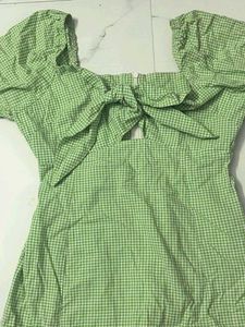 Green tie on summer dress