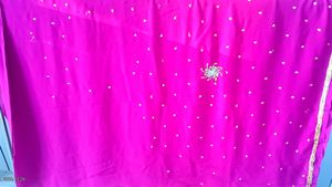 Elegant Pink Saree with Gold Embellishments