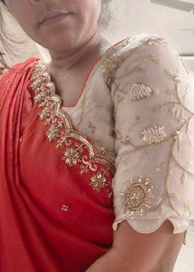 Orange Pure Tissue Embroidered saree