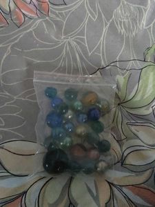Bag of colorful glass marbles