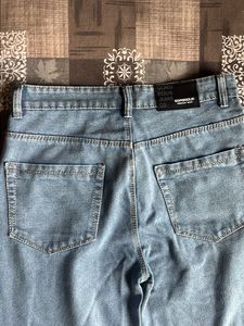Light Wash Wide Leg Jeans with Butterfly Detail