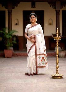 Elegant Cream Saree with Floral Border
