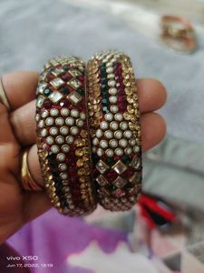 Beautiful golden multi colored bangles for any occassion used once or twice...might luk little fade due to storage