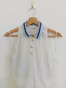 Chic Sleeveless White Polo Top