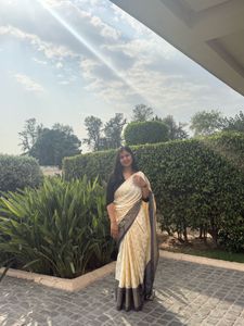 Elegant Cream Saree with Dark Border
