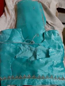 Stunning Turquoise Saree with blause hand work sto
