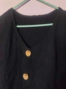 Chic Black Textured Crop Top with Gold Buttons