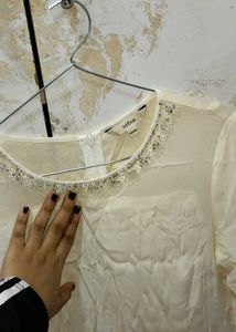 Elegant Beaded Cream top