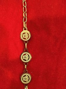 Gold Chain Bracelet with Medallion Charms