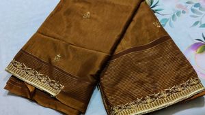 Elegant Brown Striped Saree with Gold Embroidery
