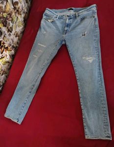 Light Wash Distressed Denim Jeans