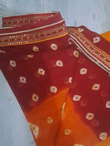 used Beautiful Maroon  orange Bandhani Saree
