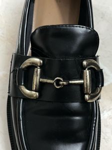 Classic Black Loafers with Gold Buckle